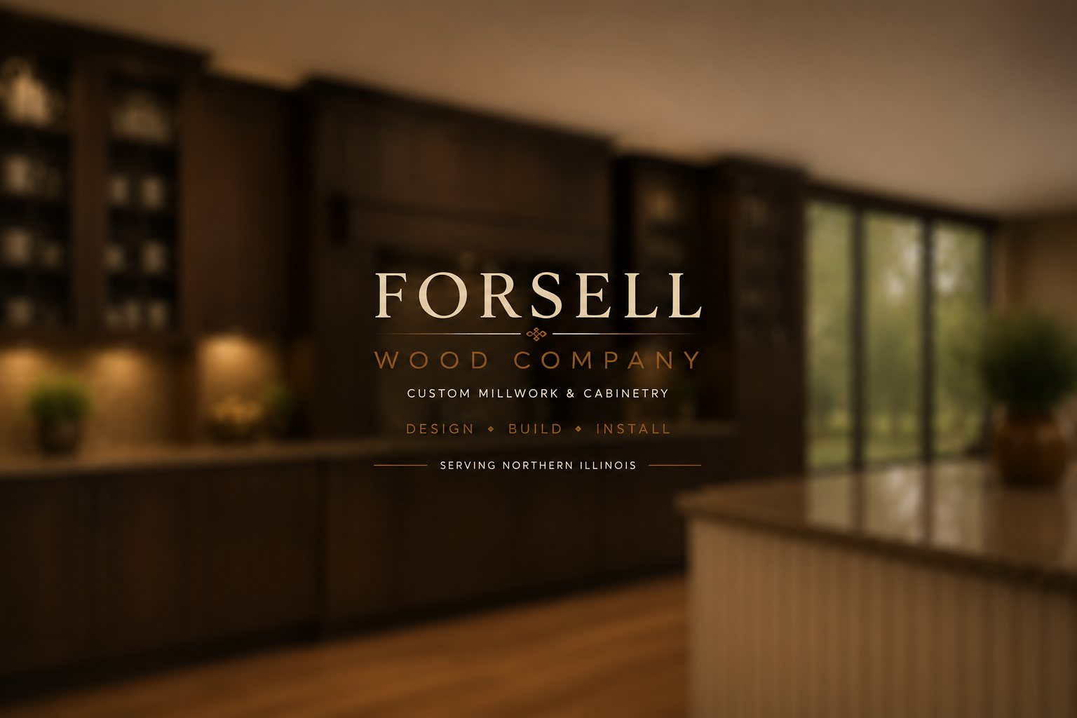Forsell Wood Company. Custom millwork and cabinetry. Design, build, install. Serving Northern Illinois. Shown behind the lettering is a dark stained custom kitchen with glass-front upper cabinets and a stone-topped island.